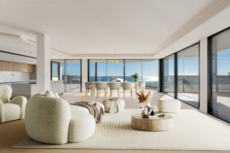 Salón amplio con comedor y ventanales con vistas al mar